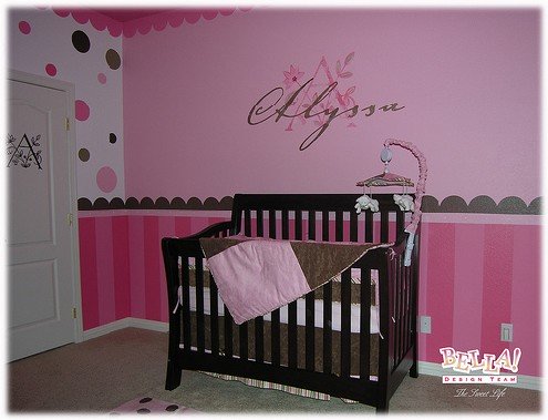 Pink nursery with stripes and polka dots
